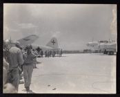Japanese dignitaries on airfield tarmac
